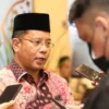 kamarudin menjelaskan sidang isbat