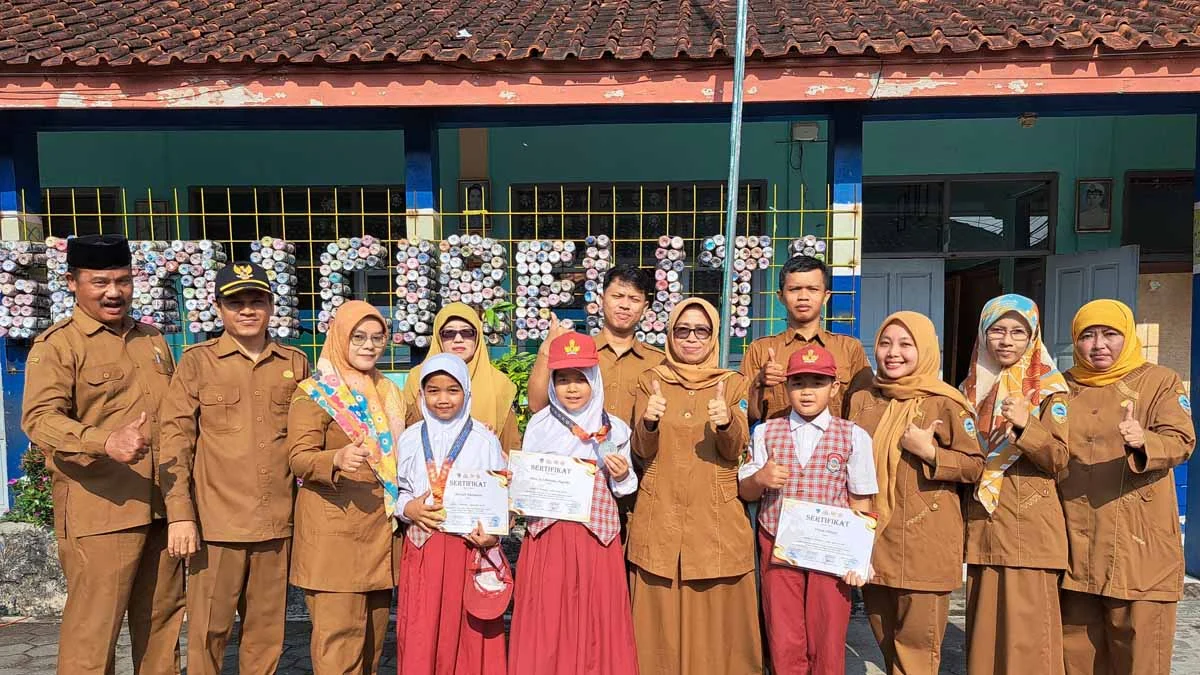 judi slot Tiga Siswa SDN 1 Cibeuti Kecamatan Kawalu Kembali Raih Prestasi, Sumbang Medali di Cabang Pencak Silat