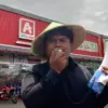 Minimarket alfamidi ilegal, kasus pidana, perizinan usaha