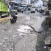 Jalan Pasar Cikurubuk rusak