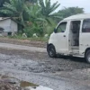 Jalan mangin rusak